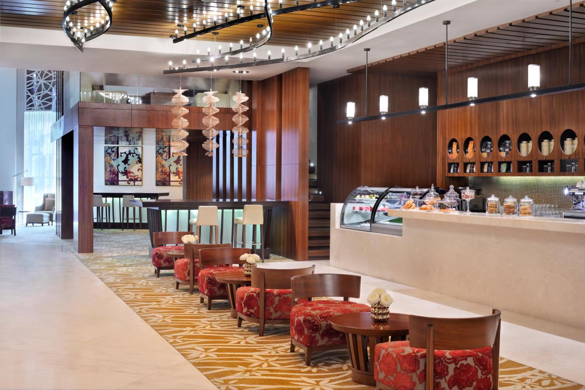 Marriott Executive Apartments Al Jaddaf, Dubaï Extérieur photo The Lounge at the airport