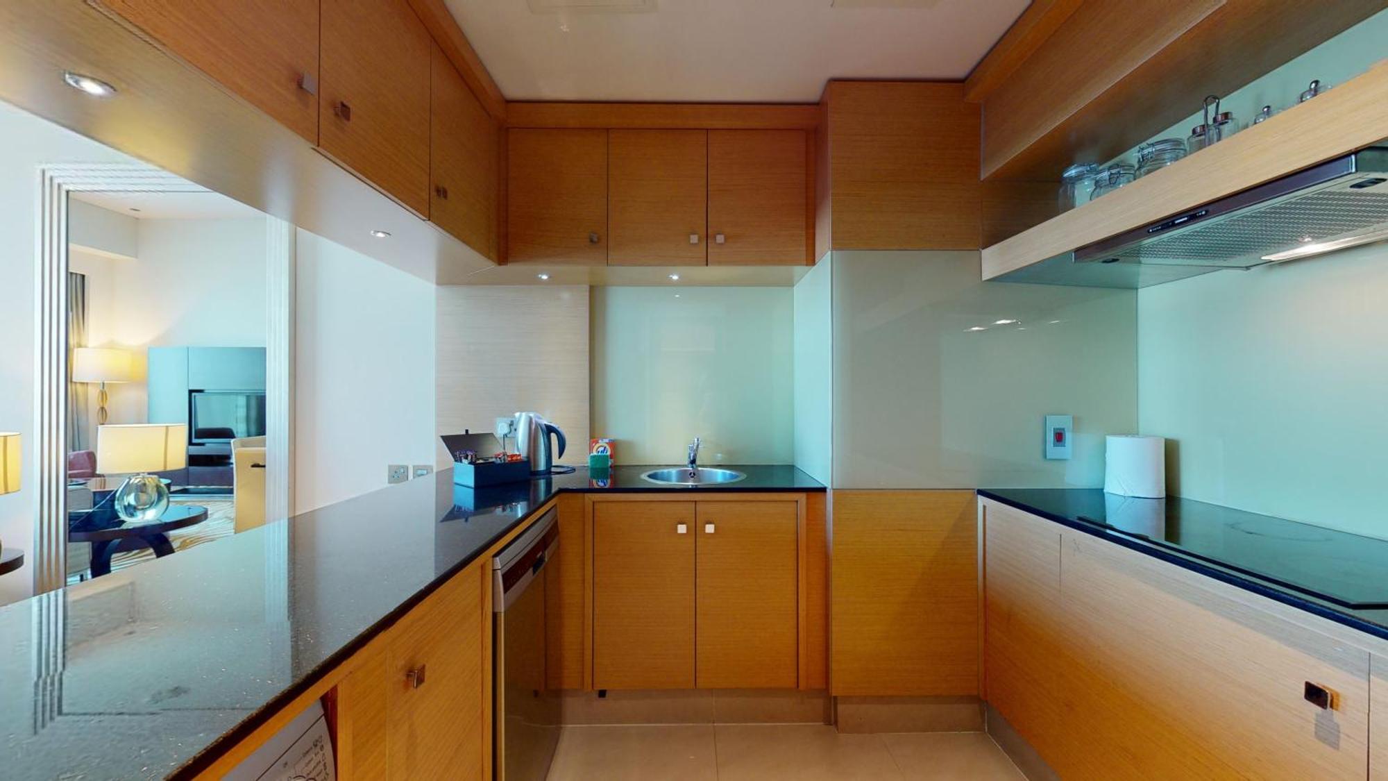 Marriott Executive Apartments Al Jaddaf, Dubaï Chambre photo A kitchen in a hotel suite