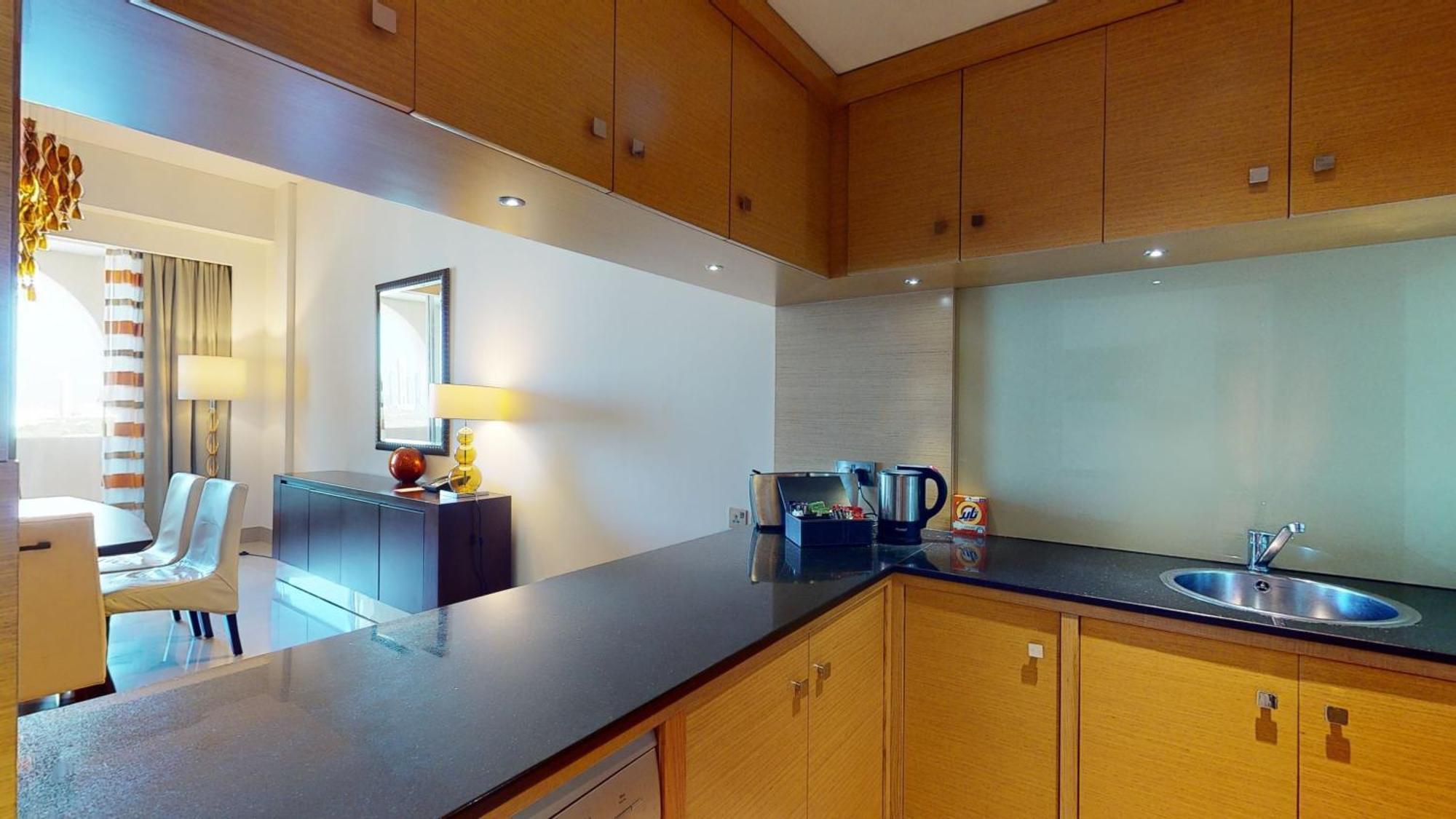 Marriott Executive Apartments Al Jaddaf, Dubaï Chambre photo A typical kitchen in a serviced apartment